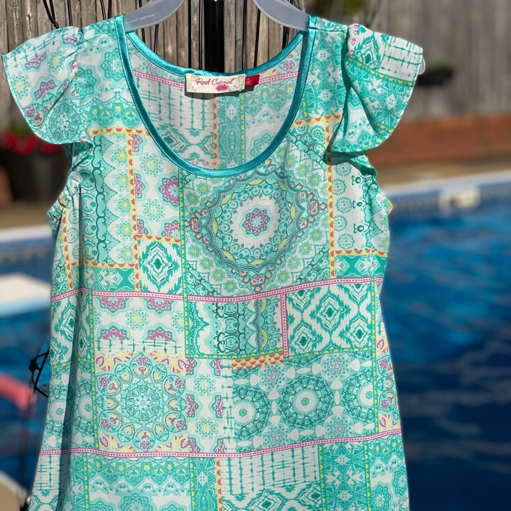 4 for $20. Girls shirt, size (M) 6/7